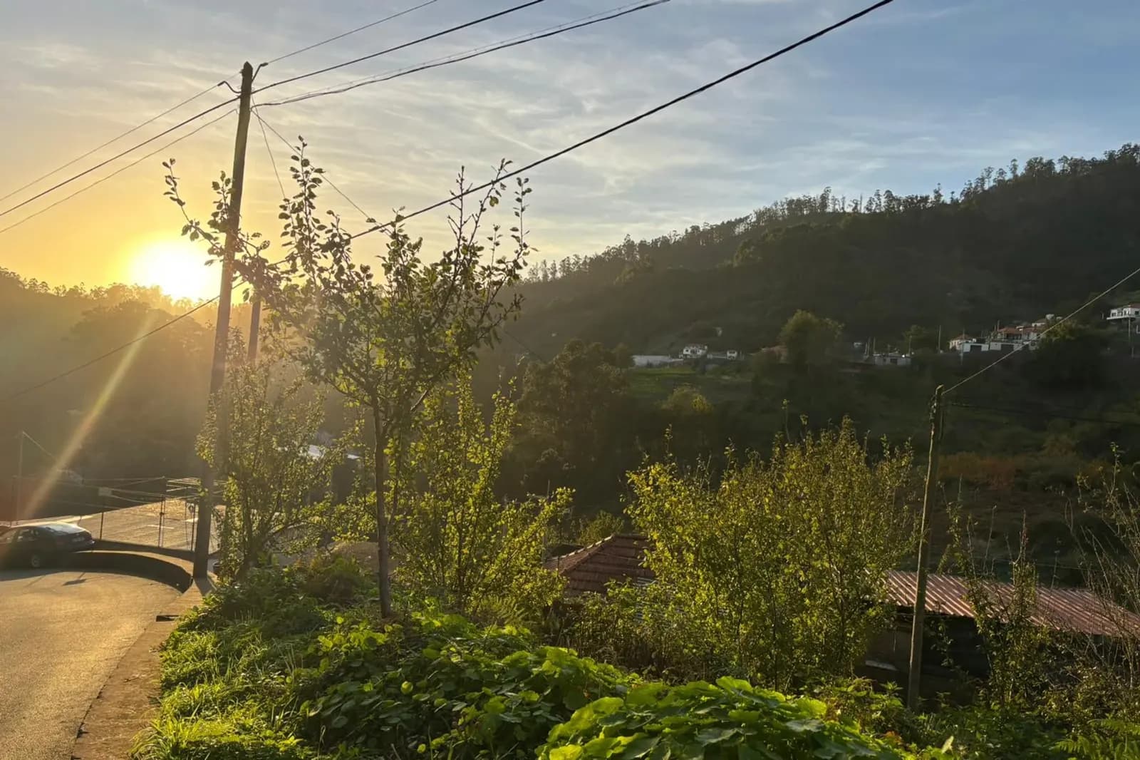 Golden sunrise over the hills at the start of the tour